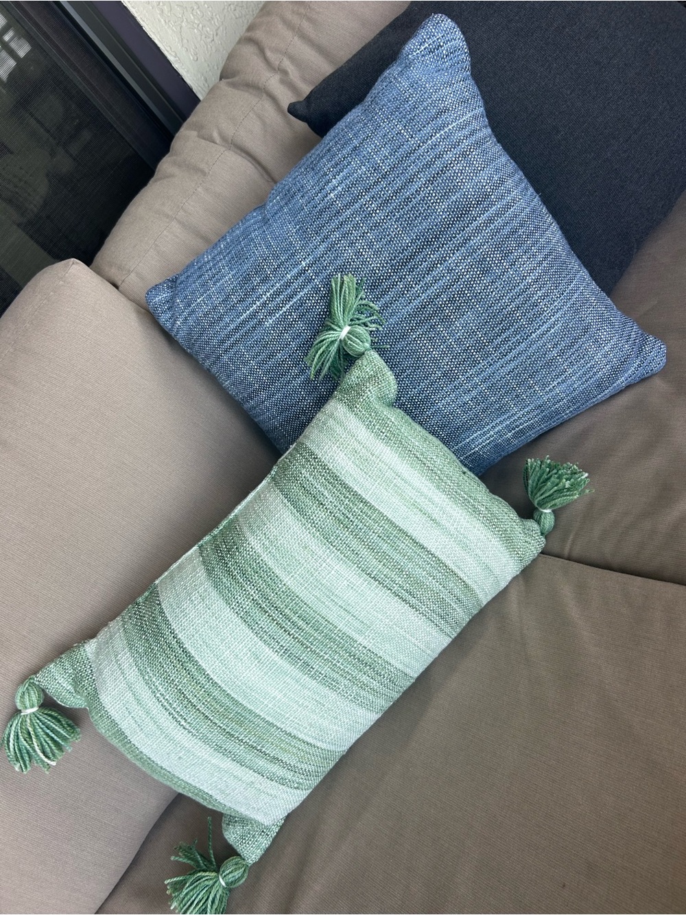 World Market Green Striped Tassel Lumbar Pillow and Blue square pillow